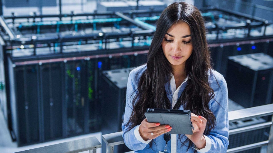 woman using tablet in datacenter