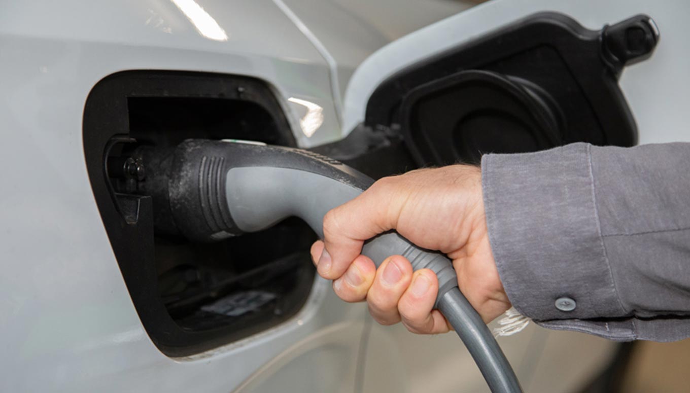 Electric car charger in car