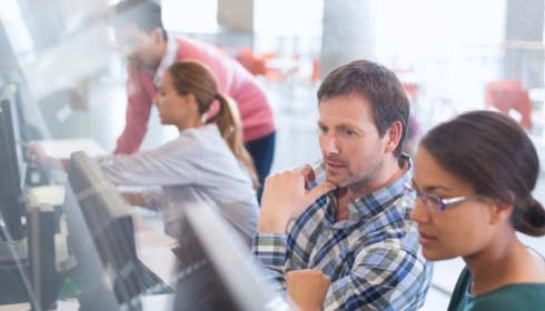 Students at computers in adult education classroom