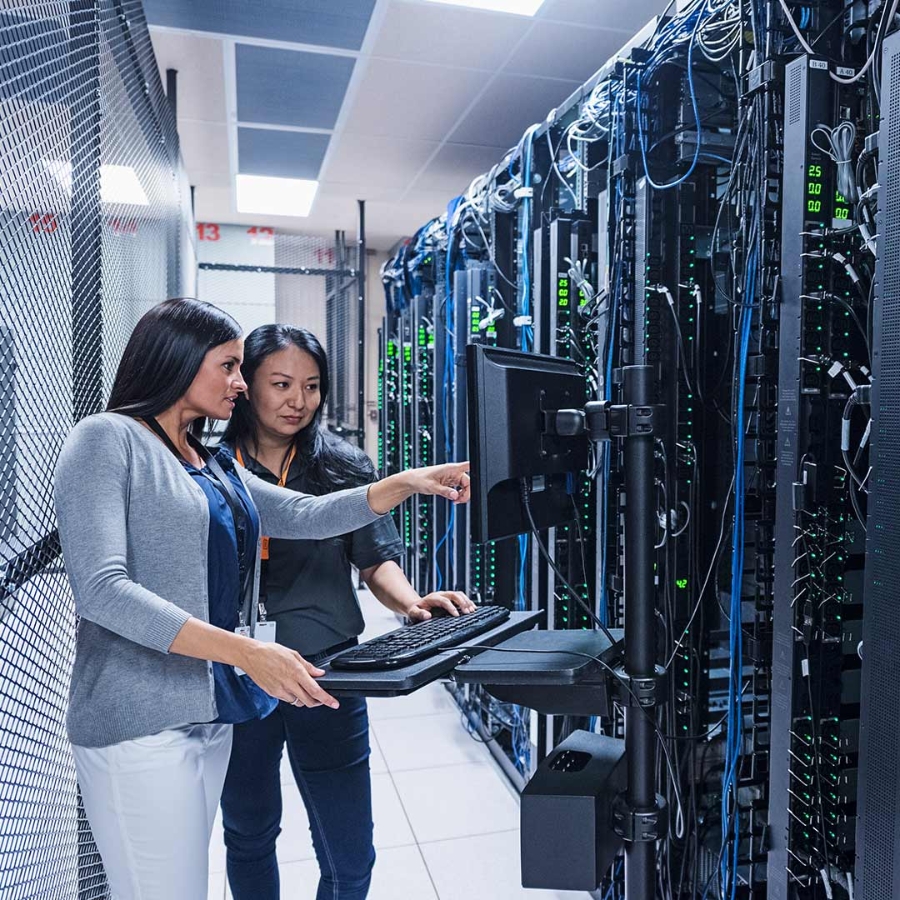 Two women at server room