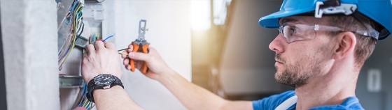 electrician is fixing a wire