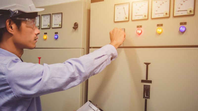 man controlling a machine