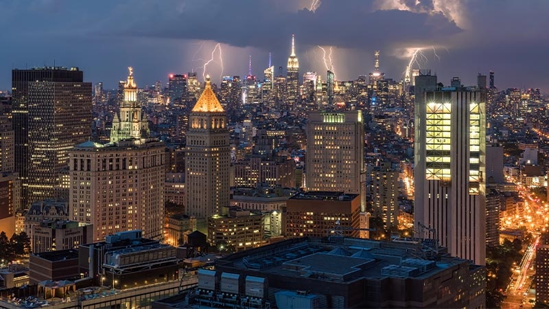 A city with lightning in the sky