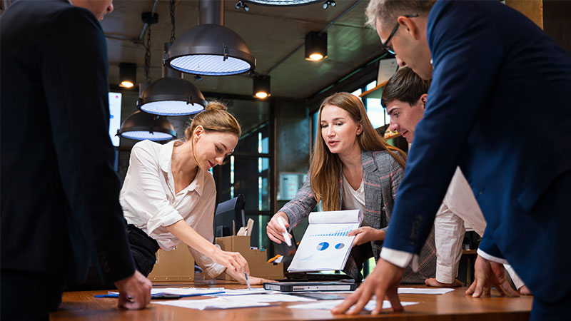 Female Business Development Leader having a project status meeting