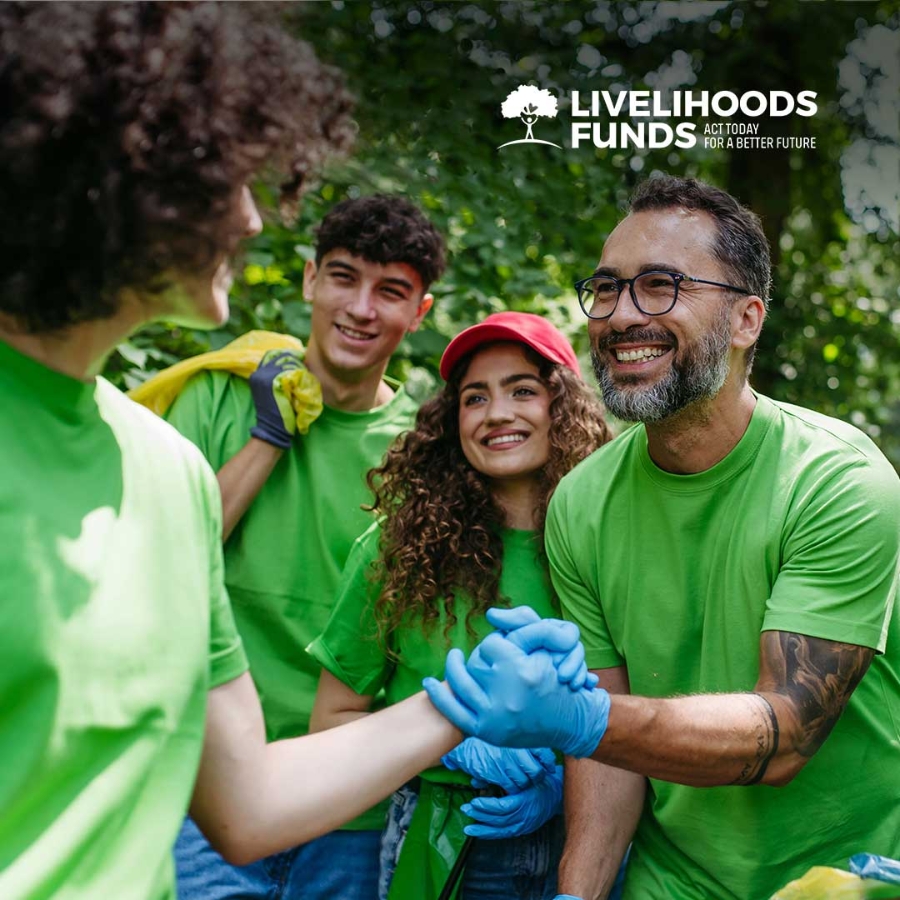 A group of people in green t-shirts