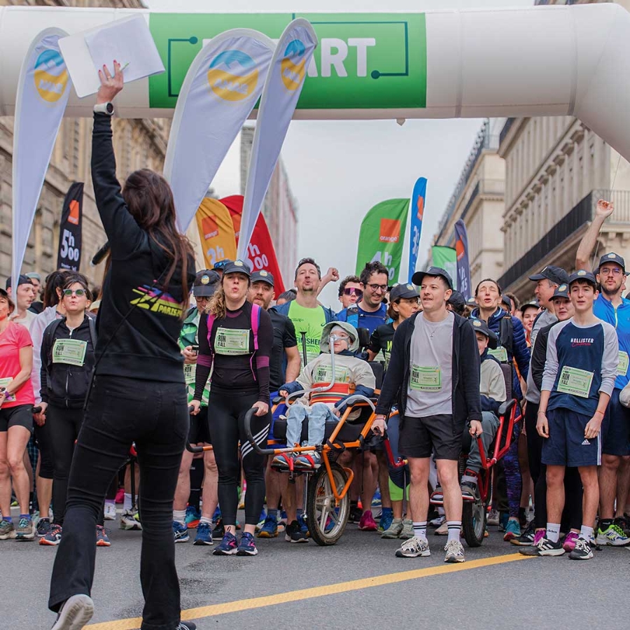 A group of people in a marathon