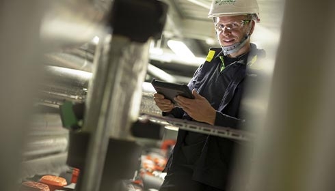 member of a service team reviewing the results of data center performance assessments