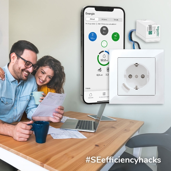 two people on a Laptop - Phone showing 