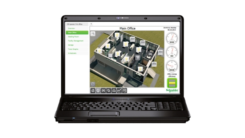 A computer with a computer screen showing a building