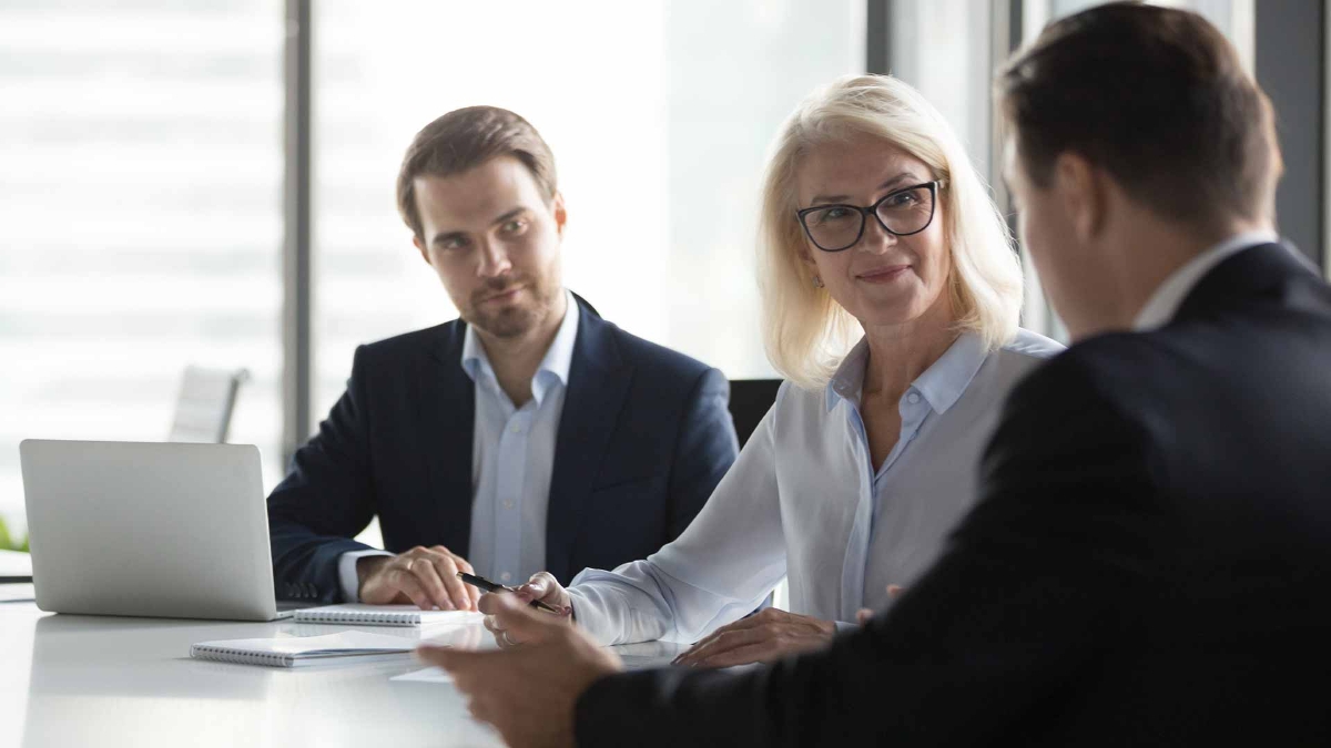 A group of people sitting at a table