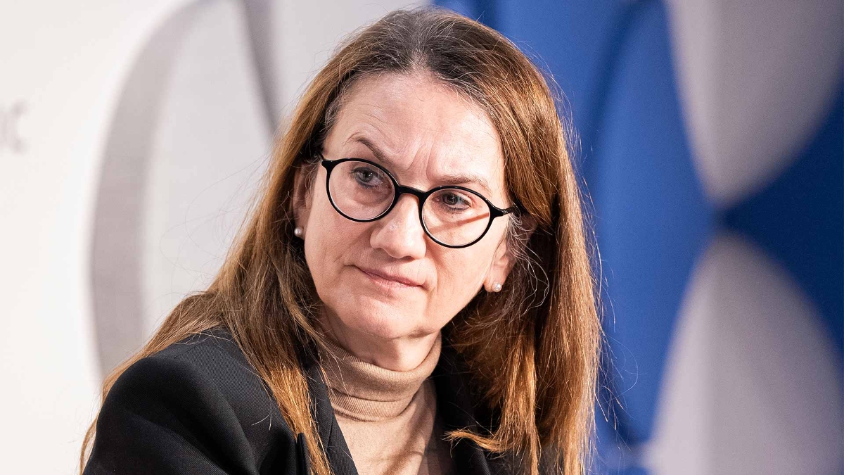 A person with glasses looking at the camera