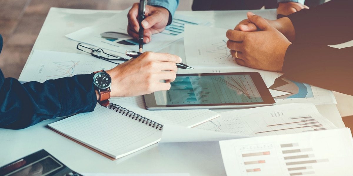 business people doing the statistical analysis during a meeting