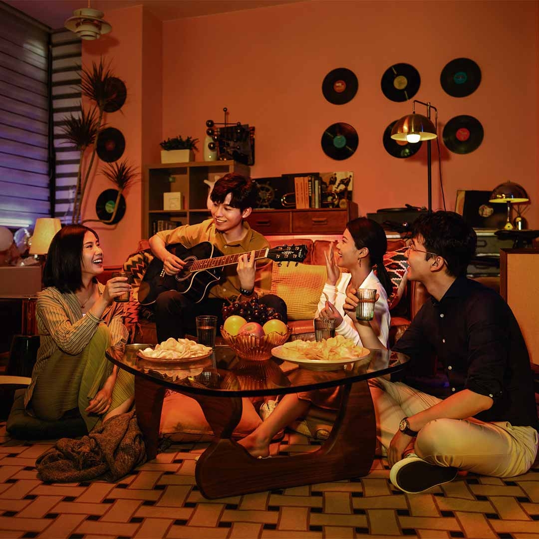 Friends are enjoying in living room 