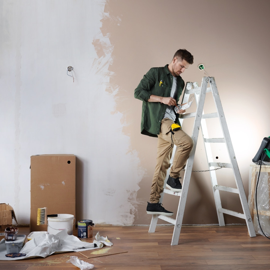 Man Painting a wall