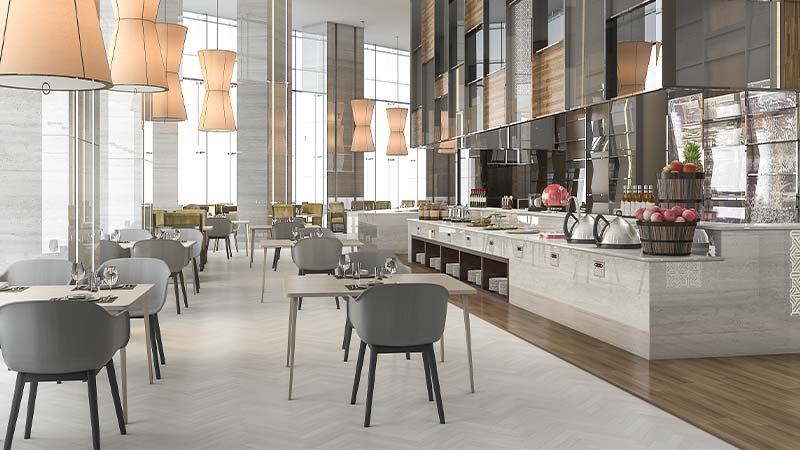 A restaurant with tables and chairs