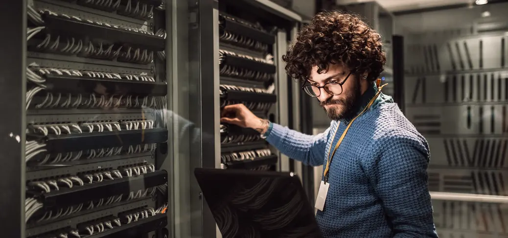 Person working on data servers.