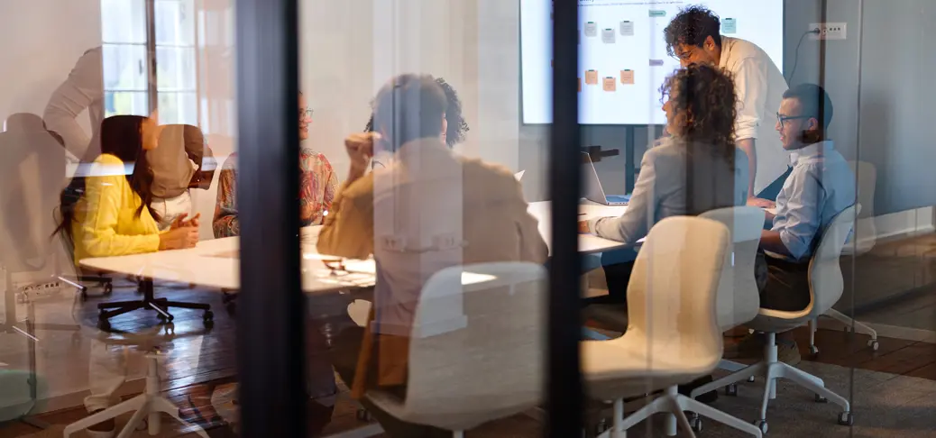 A man is holding a tablet