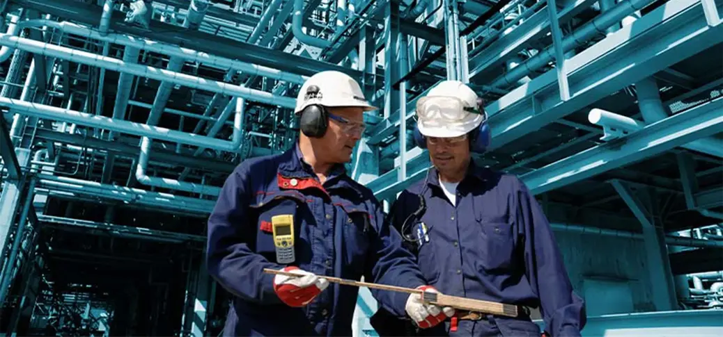 A few men in hard hats and helmets