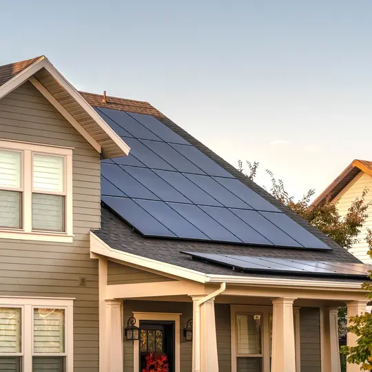 Solar photovoltaic panels on a house roof