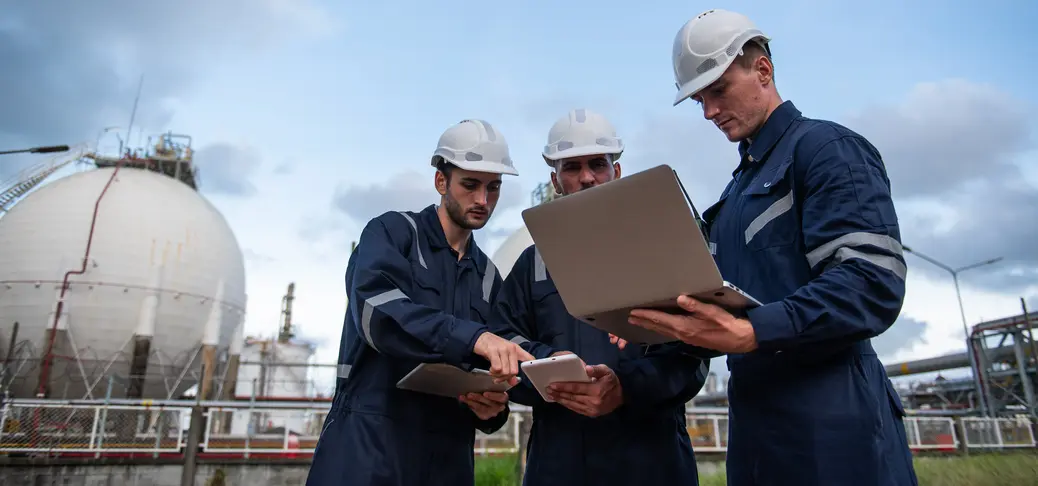 Refinery industry, engineer working on computer laptop