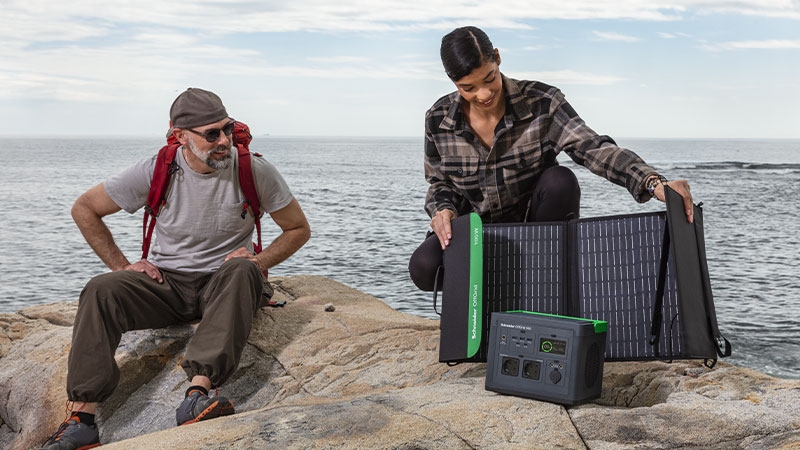 A girl or boy sitting on the beach