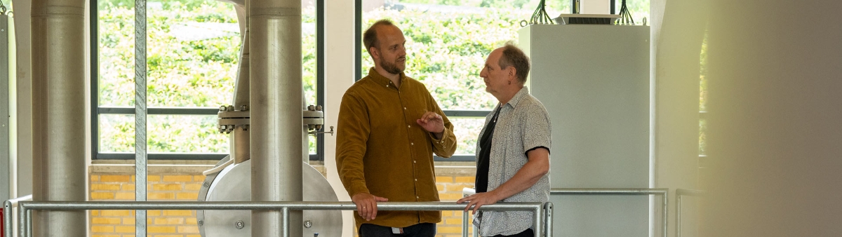 Two men in factory
