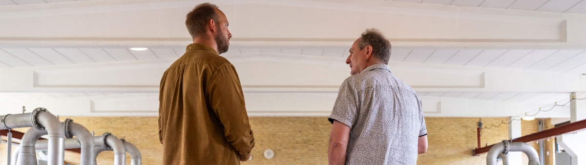 Two men in factory
