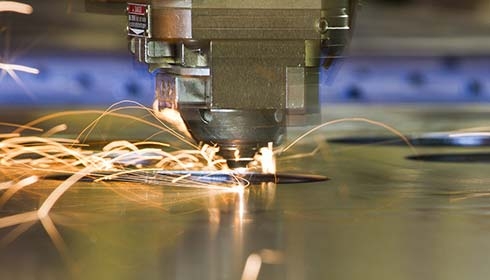 Close-up of a laser cutting machine