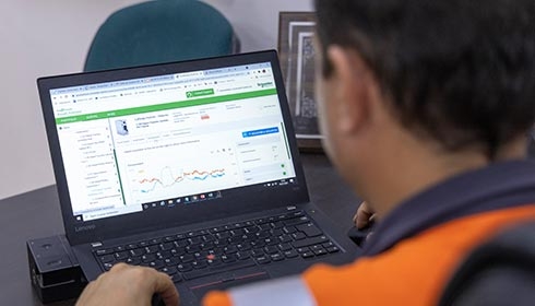 A employee working on his laptop