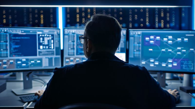 a man working on computers