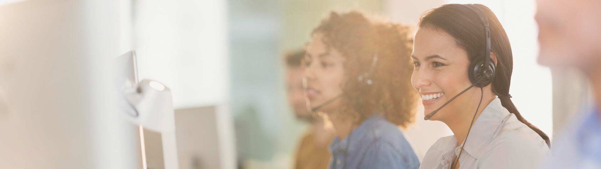Girl using their headphones while working