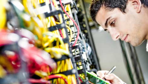 Technician working on network for cloud service providers
