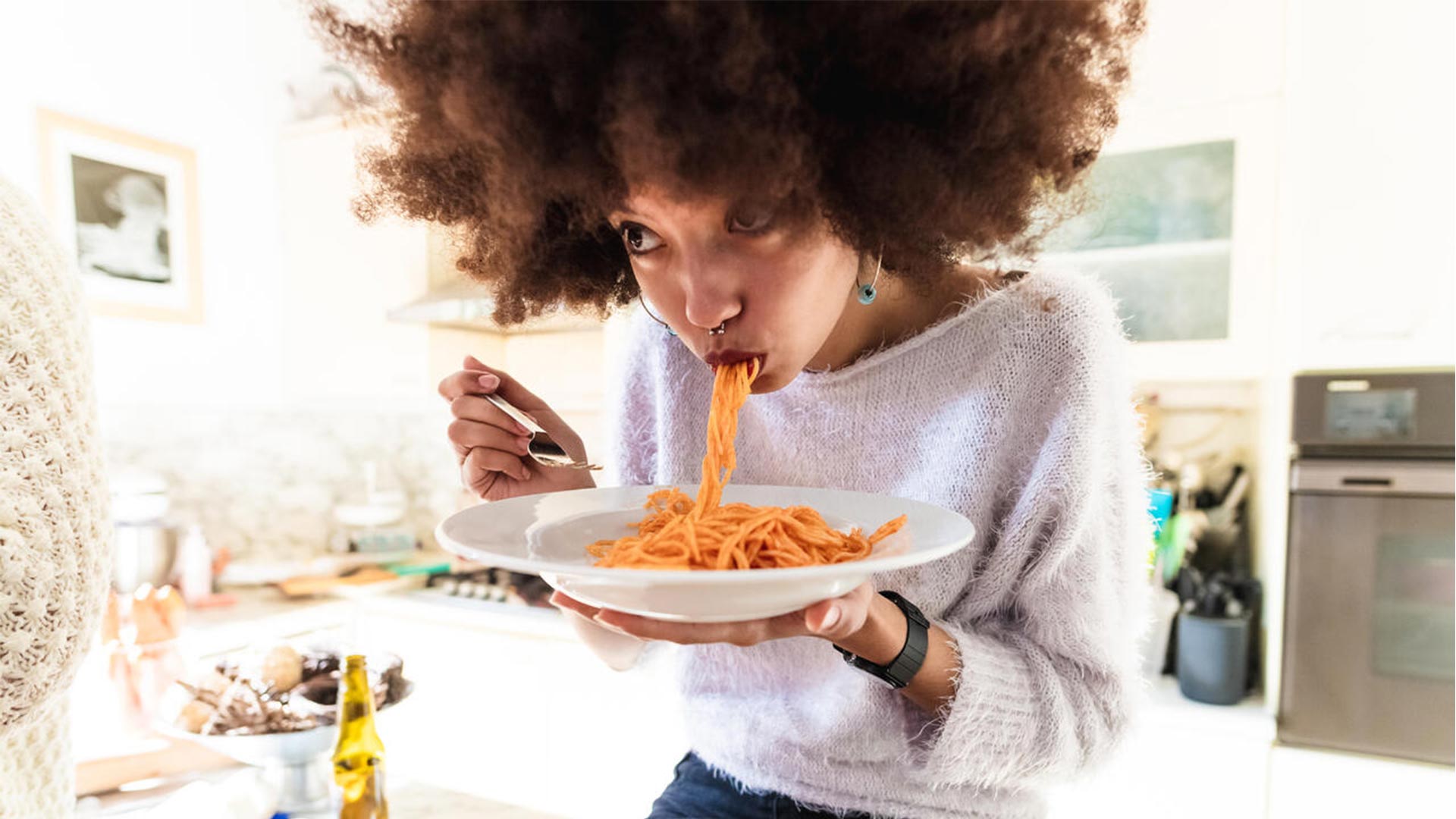 Women eating Spaghetti