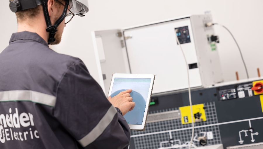 technician configuring Smart Main Unit 