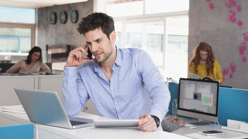 employee is talking on mobile phone 