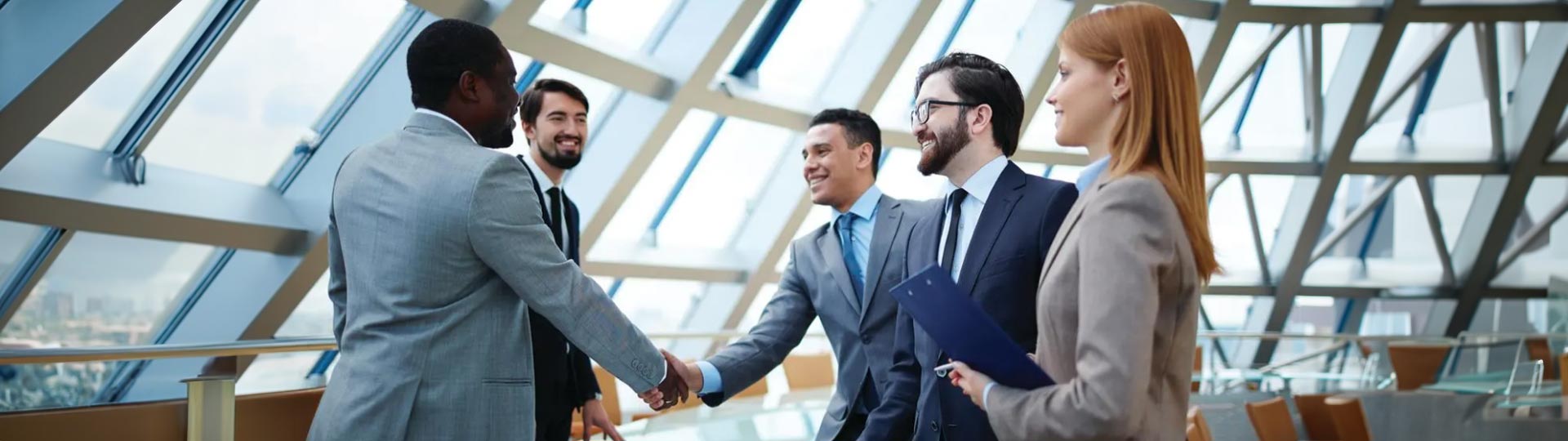 A group of men shaking hands