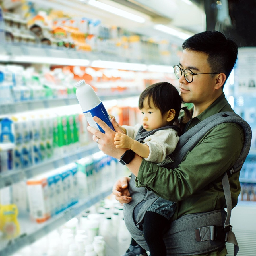 Father with his son doing shopping in Supermarket