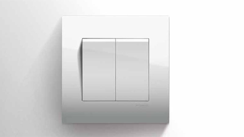 A white switch with two buttons