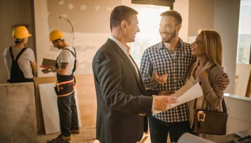 a mother and her daughter at home reading a book