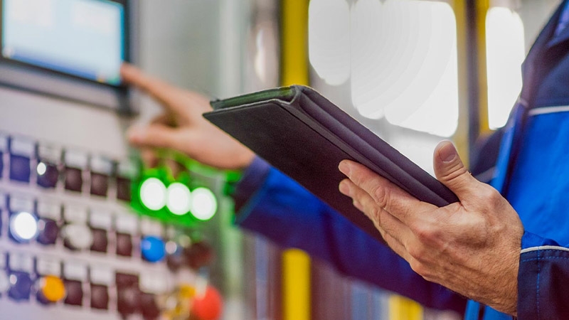 A person holding a tablet