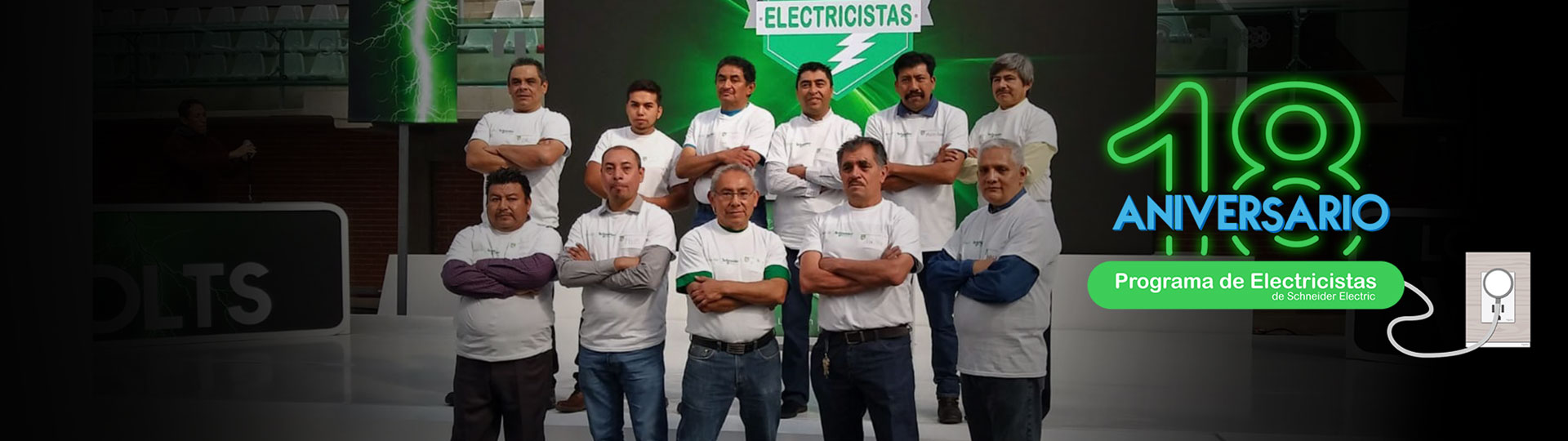 A group of electrician posing for a photograph