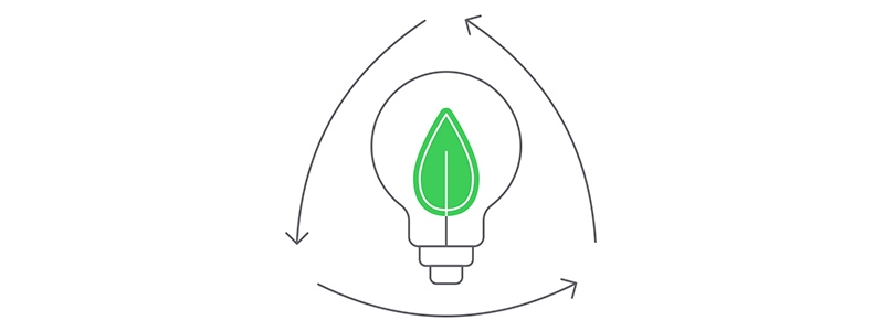 A light bulb with a leaf inside