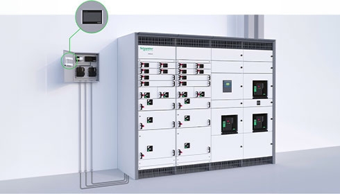 A white cabinet with black buttons