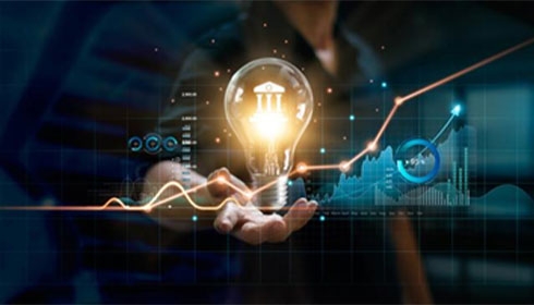 A person holding a light bulb