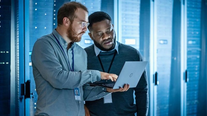 A person looking at a computer