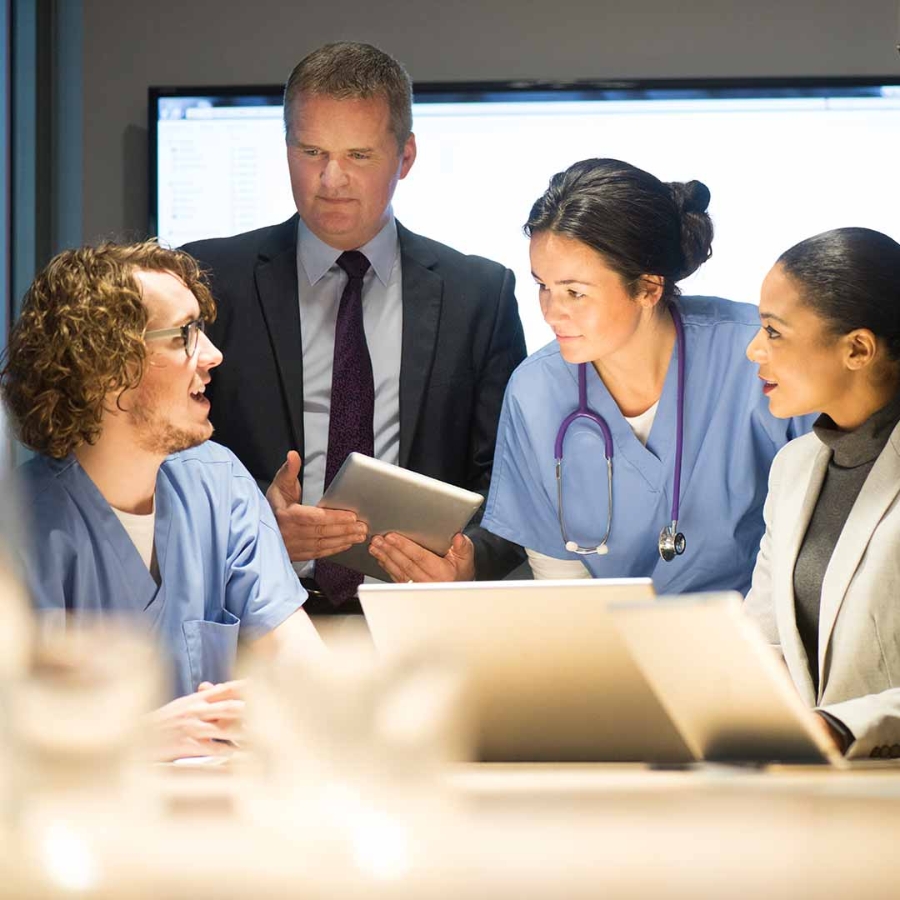 A team of doctors discussing in a meeting area