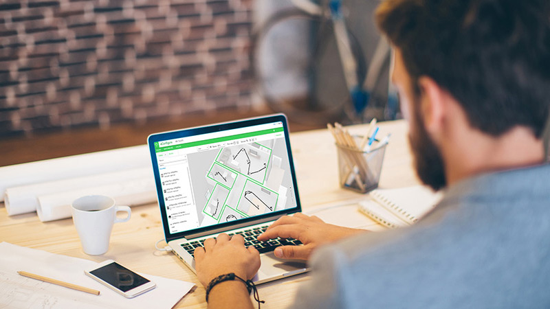 A men is working on the laptop!