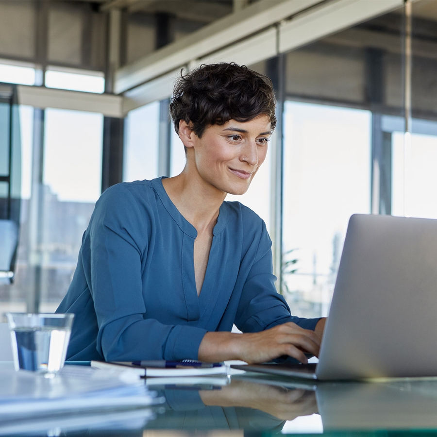 woman in short hair working in modern office