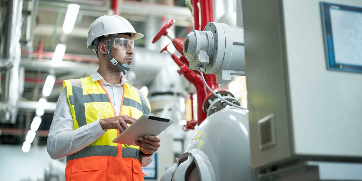 technician checking the resiliency of installation 