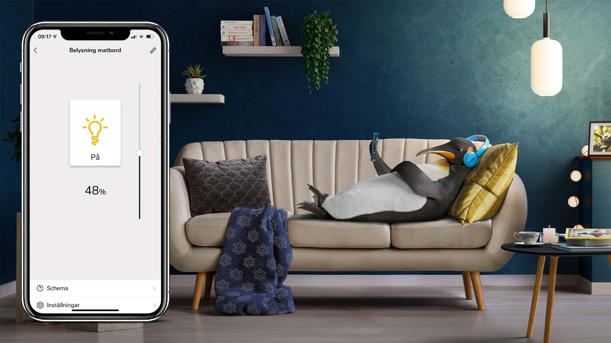 Penguin sitting on couch with montage of mobile app screen shot
